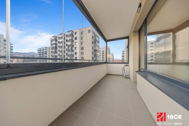 Glazed balcony of a 3-room apartment on Rudroffova Street, Bratislava - Rača with a view of the surroundings.