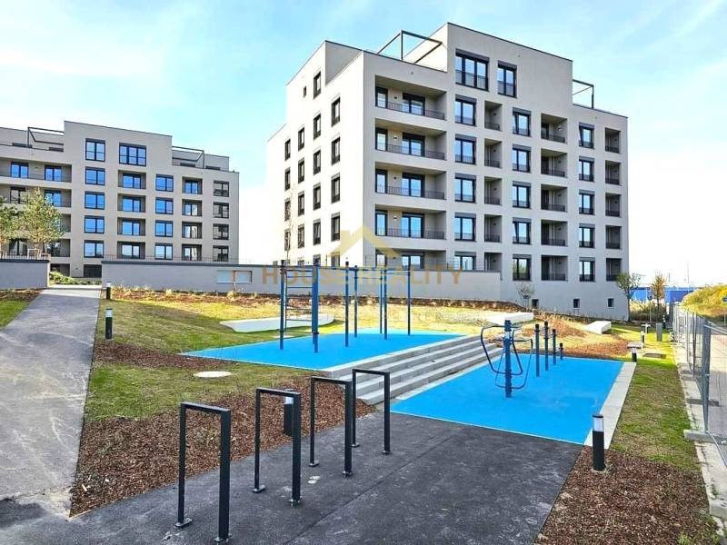 New apartment buildings on Mateja Encingera Street in Bratislava - Devínska Nová Ves with a playground.