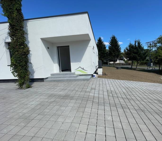 A family house in Michalovce on Vinianska Road with a terrace and lawn.
