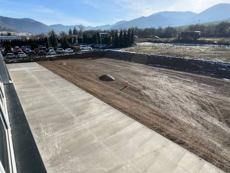 Reinforced area with a parking lot and gravel surface, Strečno, SNP, commercial premises.