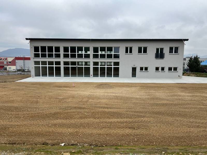 A two-story building on SNP Street in Strečno, suitable for commercial spaces.
