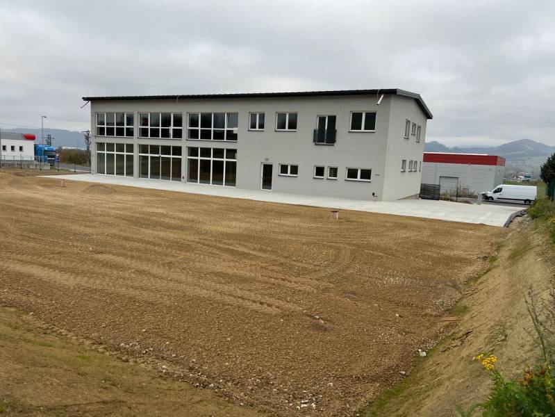A building with a glass facade in commercial premises on SNP in Strečno.