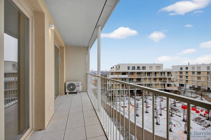 Balcony with a view of the snowy courtyard, 2-room apartment, Bajkalská Street, Bratislava.