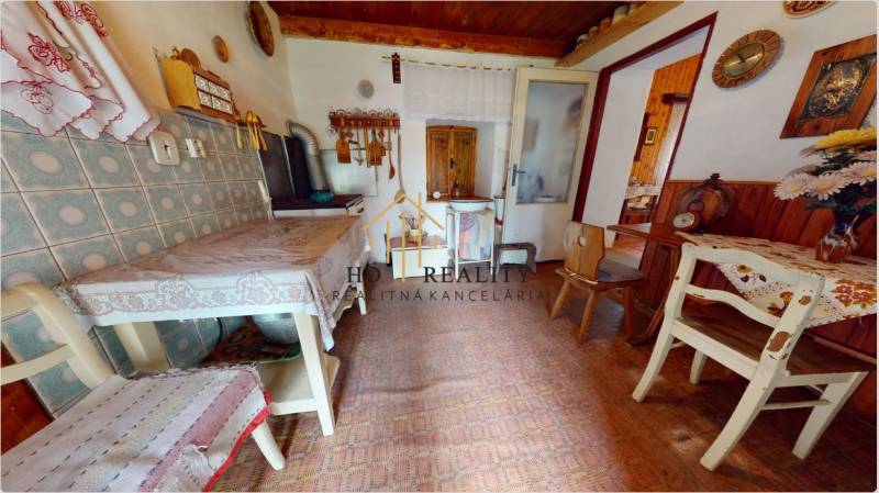 Interior of a family house with rustic furniture and a wooden decor floor.
