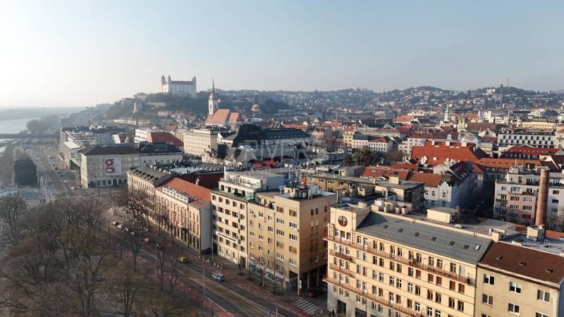 A view of Bratislava, Vajanského Embankment, and the Old Town, with the dominant Bratislava Castle.