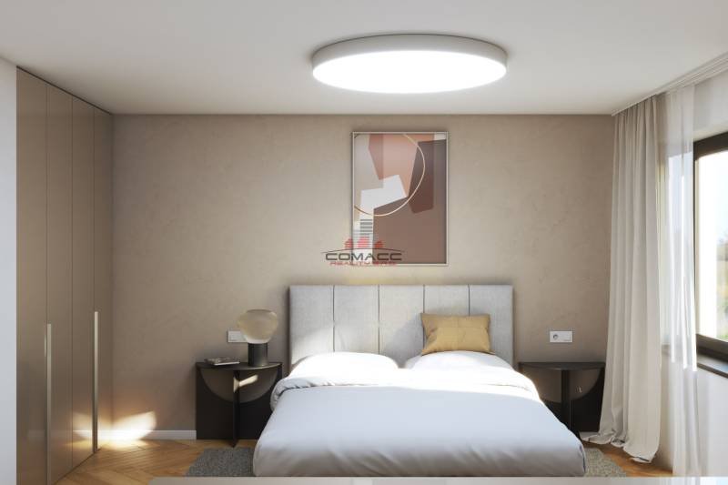 On Špačince Street, a family house with a bright bedroom, a bed, a window, and a painting.