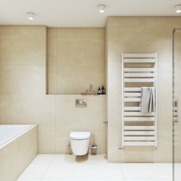 Bathroom with a bathtub, wall-hung toilet, linear drain, and white ladder on the wall.