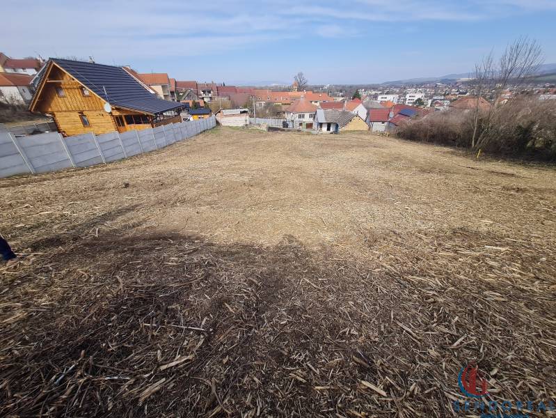 Plots - housing on Poľná Street in Banka with a view of the city and houses.