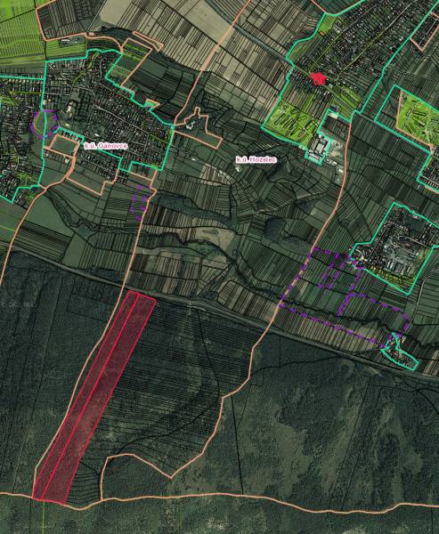 Aerial view of agricultural and forest lands around Hozelec.