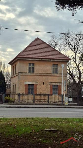 A family house on Levická Street in Vráble with a brick facade and a sloped roof.