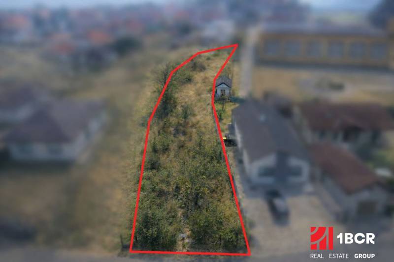 A plot for residential use in Horné Orešany with marked boundaries on an aerial photograph.
