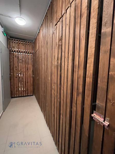 A storage space with wooden walls in a 3-room apartment.