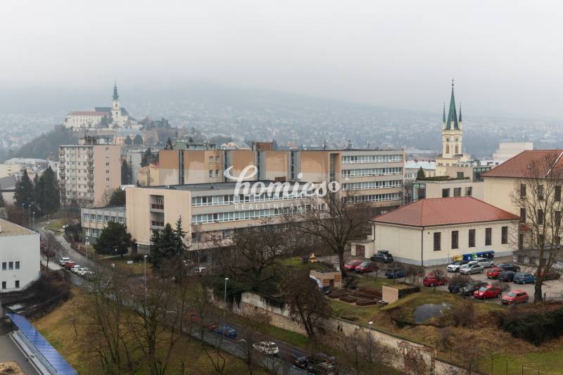 View from a 2-room apartment in Nitra with a panorama of the city and the church.