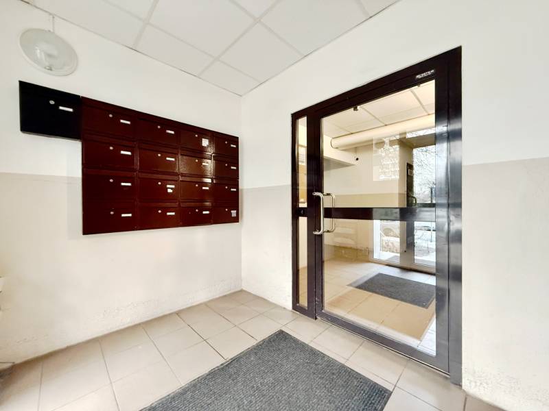 Entrance hall of an apartment building in Bratislava - Lúky with mailboxes.