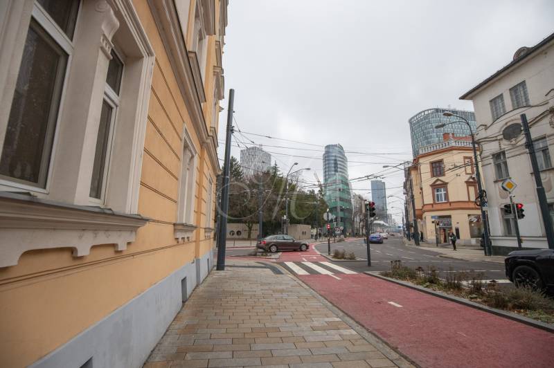 View of Dunajská Street in Bratislava - Old Town with high-rise buildings.