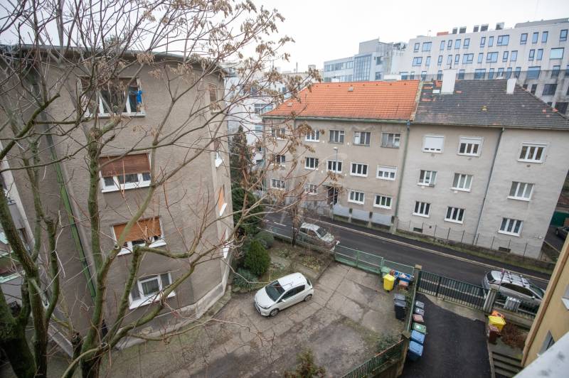 View of Lermontova Street, Bratislava - Old Town, with a parked car in the yard.
