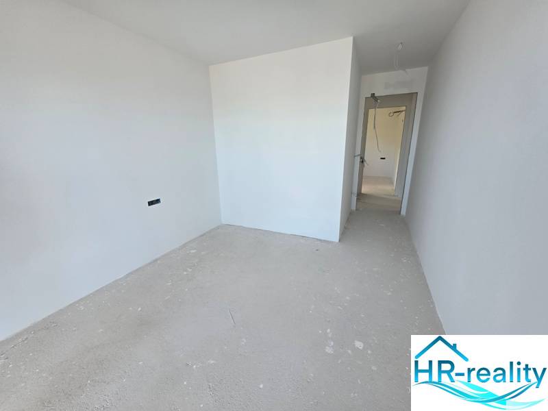 Recreational apartment with white walls and basic flooring without decor.