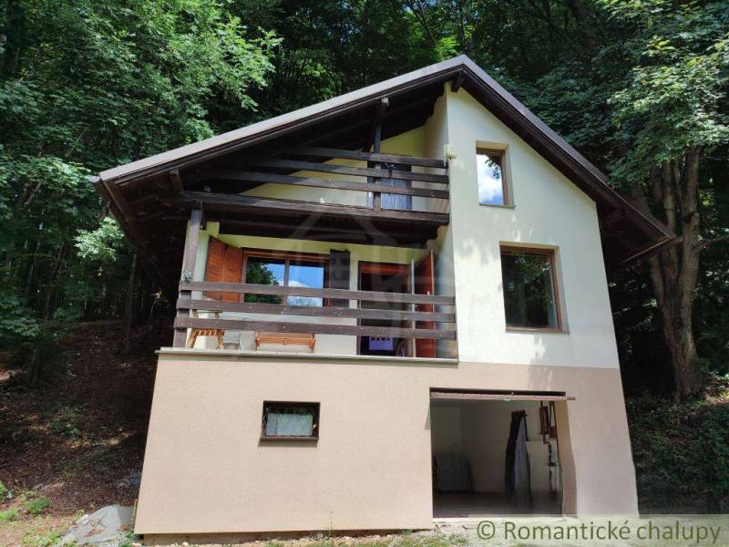 A family house in Mojtín surrounded by forest with a balcony and terrace.