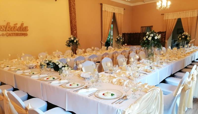 Banquet room with decorations and festively set tables in hotels and guesthouses.
