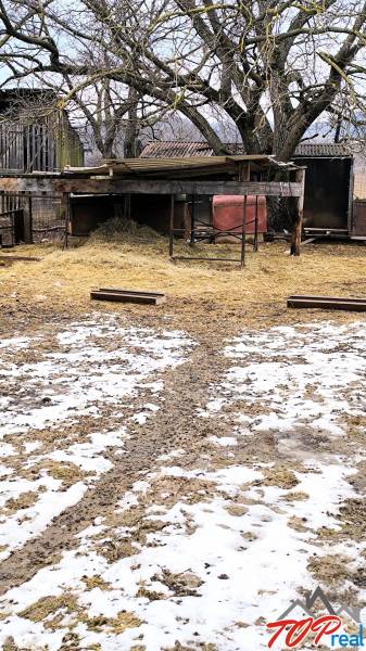 Snow cover on a residential plot in Krásnohorské Podhradie, Mierová.