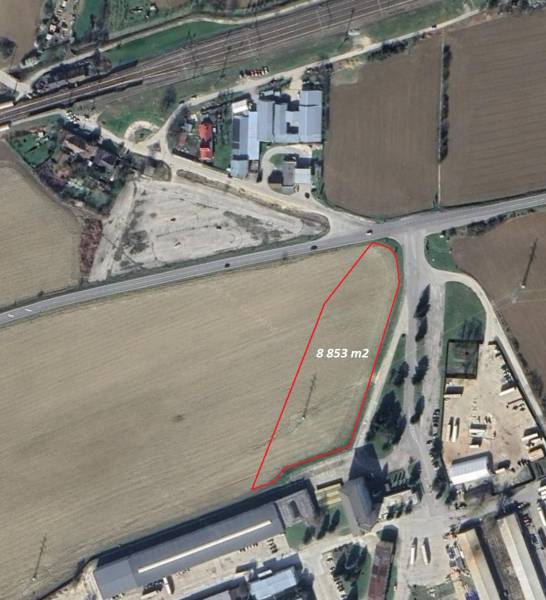 Aerial view of commercial land in Trenčianske Bohuslavice, bordered by a red line.