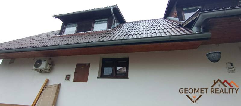 A family house on Cintorínska Street in Divín with skylights and air conditioning.