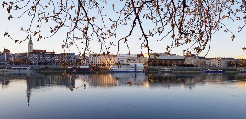 Panorama of Bratislava from the Old Town, view of Rázusovo Embankment with the reflection of the river.