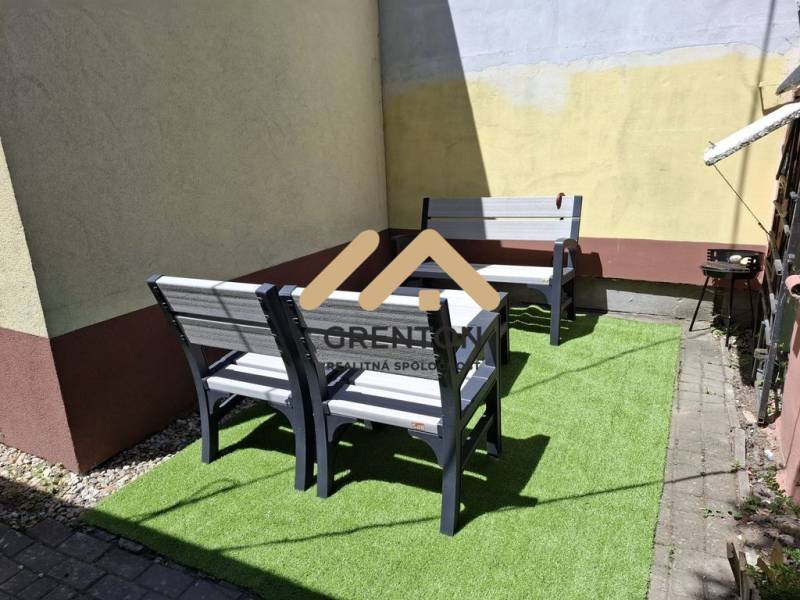 Exterior with garden furniture on Studená Street in the Ružinov district of Bratislava.