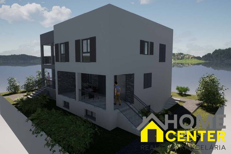 A recreational apartment in Čiovo with a view of the sea and surrounding greenery.