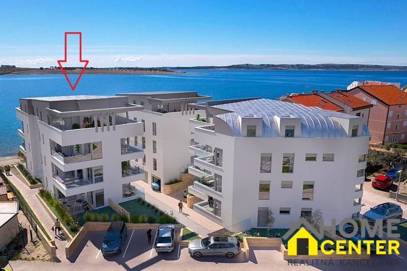 View of the sea bay with a holiday apartment in the town of Pag, modern architecture by the coast.