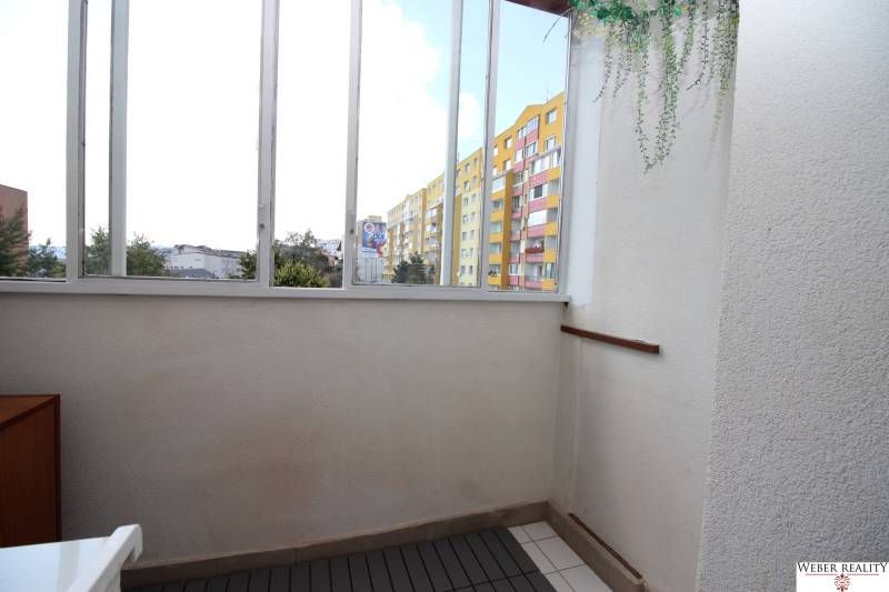 Glazed balcony on Hany Meličkovej in Bratislava - Karlova Ves, with a diverse view.