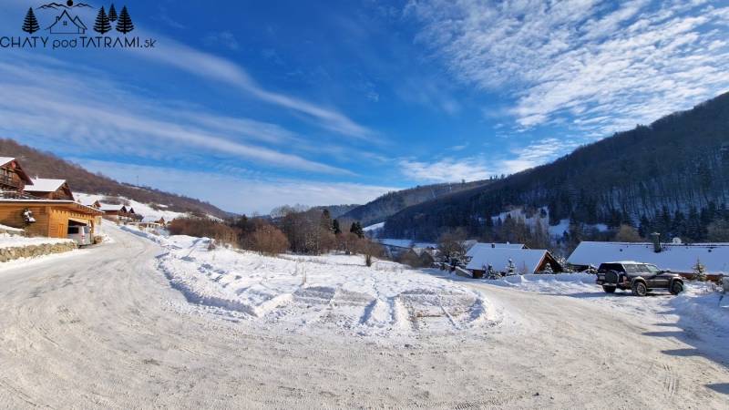 Snow-covered cottages and hills in the Recreation Land area, Fongrub, Mýto pod Ďumbierom.