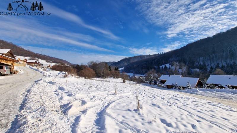 Winter landscape with snow-covered cottages in the Recreational Grounds of Mýto pod Ďumbierom, Fongrub.