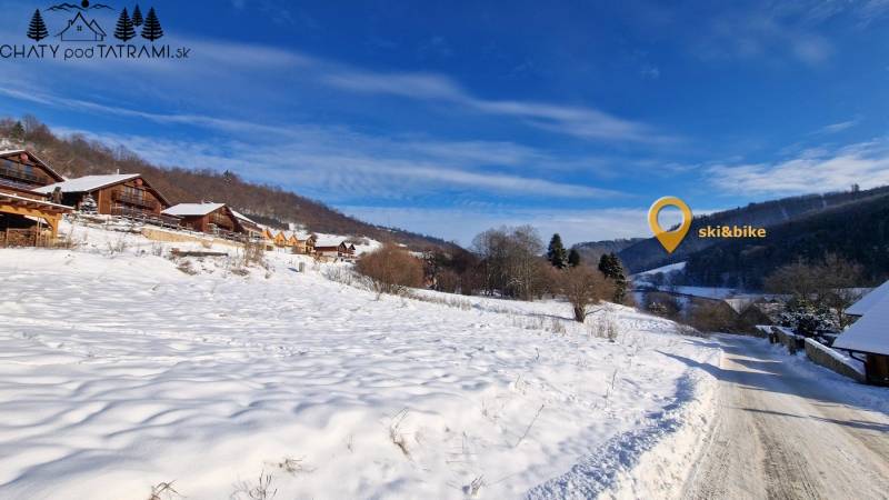 Snow-covered cottages on Recreational Land in Fongrube in Mýto pod Ďumbierom.