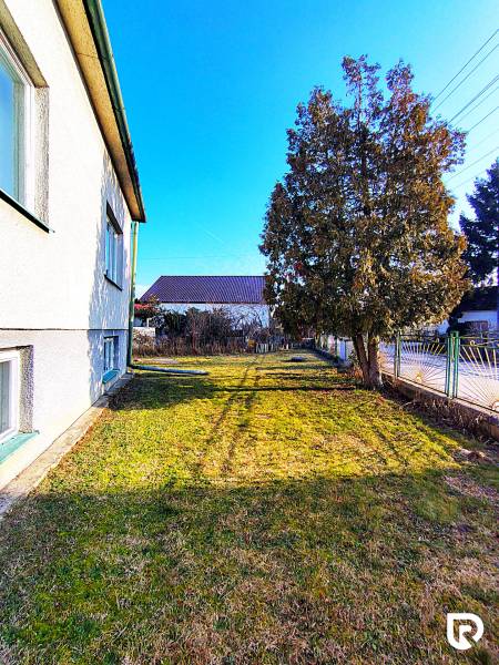 A family house on Sadová Street in Borský Mikuláš with a spacious garden and trees.