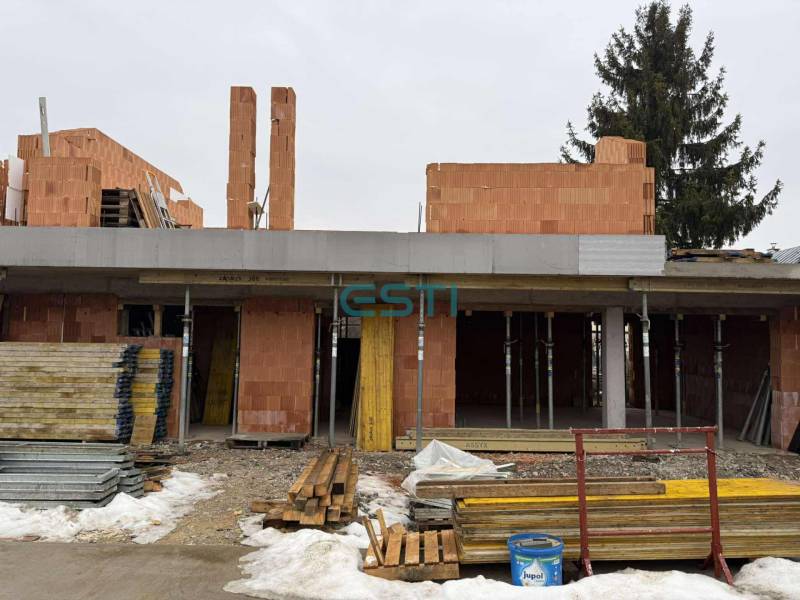 Construction of a family house on Višňová Street in Višňové, bricks, building material, snow cover.