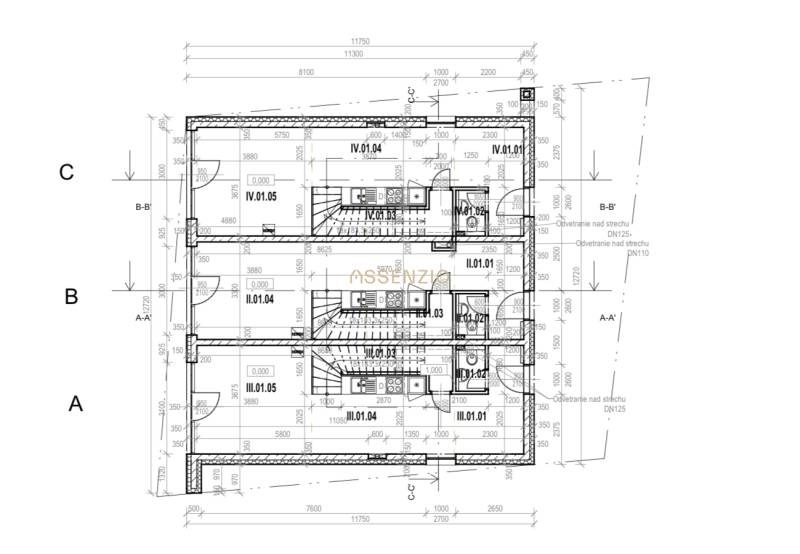 Architectural floor plan of a multi-story building showing the layout of rooms and staircases.