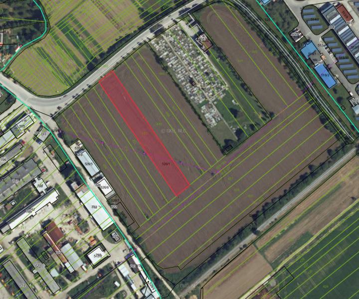 Commercial land in Pruské from above, with visible parcel numbers and surrounding infrastructure.