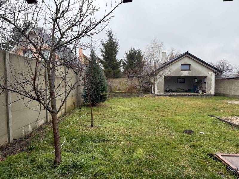 Garden behind the family house on Pri prvej kaplnke Street in Záhorská Ves.