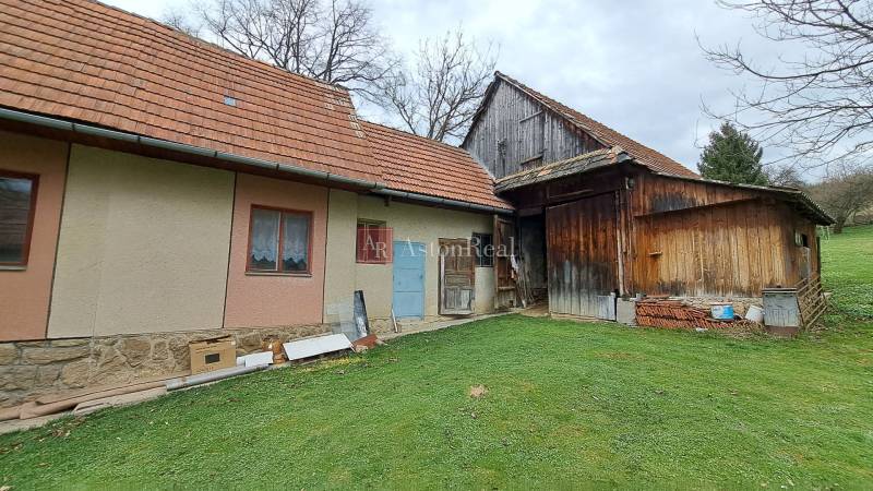 A family house on Kalameny Street in Ružomberok with a gable roof and an extension.