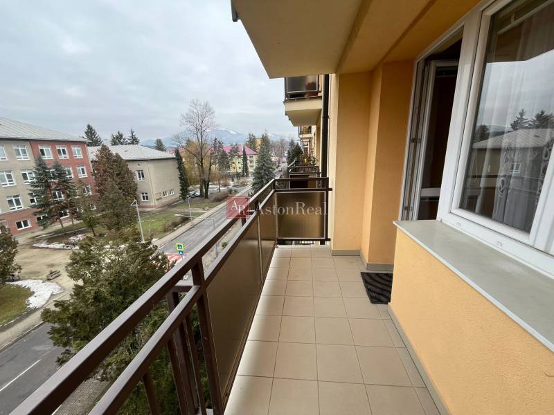 The balcony of a 3-room apartment on Golianova Street in Banská Bystrica with a view of the street.