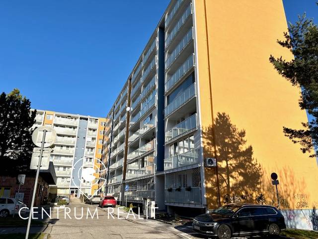 Apartment building on Tilgnerova Street in Bratislava - Karlova Ves with parking spaces.