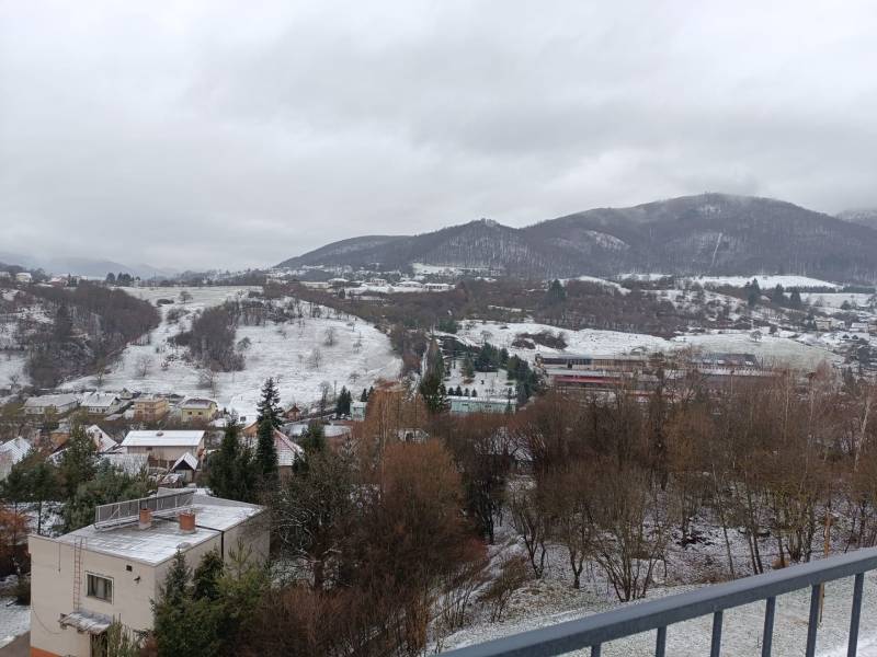 Snowy landscape in Nová Baňa from Pod sekvojou street as seen from the winter balcony.