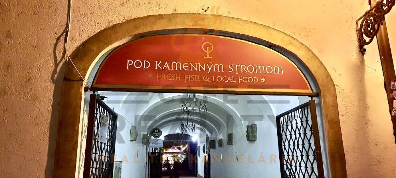 Entrance to the gastro premises on Sedlárska Street in the historical center of Bratislava.
