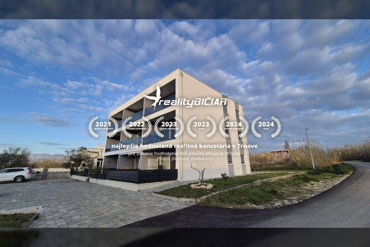 Recreational apartment on Zukve Street in the town of Vrsi with parking spaces in front of the building.