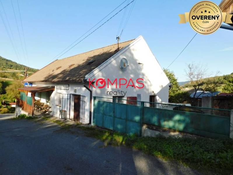 Commercial premises in Vígľašská Huta-Kalinka with a gable roof and a paved road.