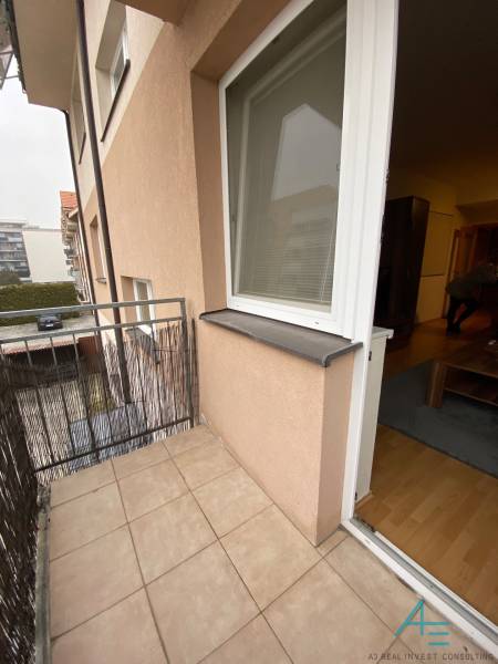 Balcony of a 2-room apartment on Dlhá Street in Stupava with ceramic tiles.