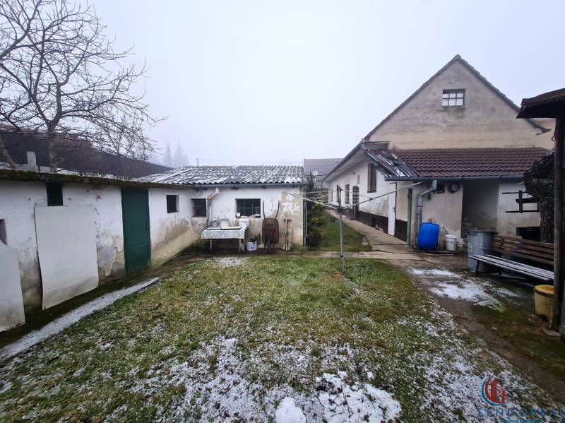 Family house on Námestie 1. mája in Chtelnica with a courtyard and annexes.