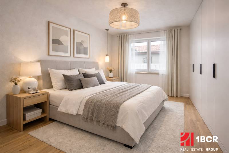 Bright bedroom with a large bed, nightstands, and a wooden decor floor in a family house.