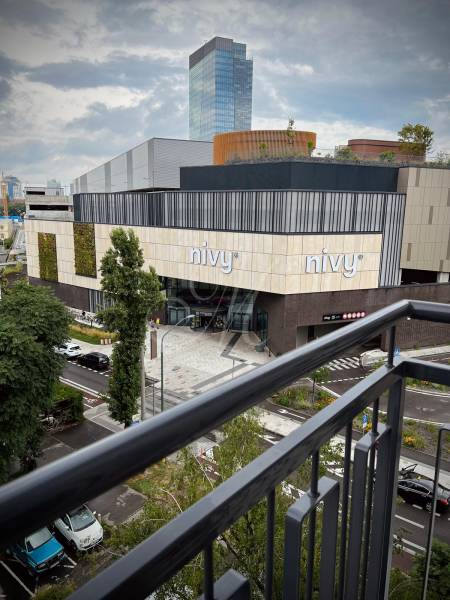 View from the balcony of the Nivy shopping center in Bratislava with modern architecture.